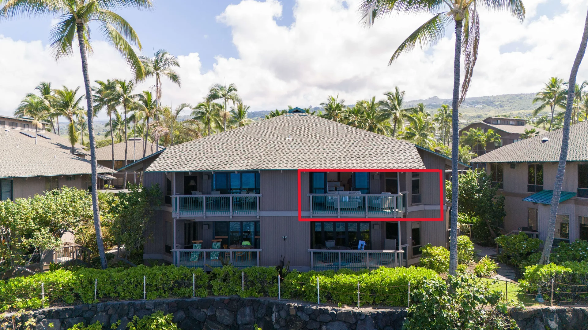 Aerial of unit building with mountains