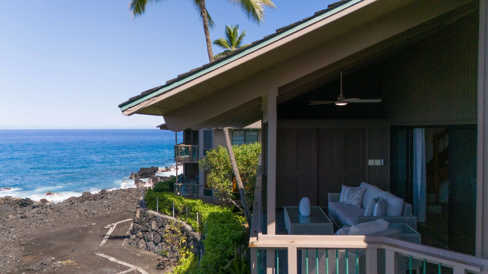 Building exterior with lanai and ocean