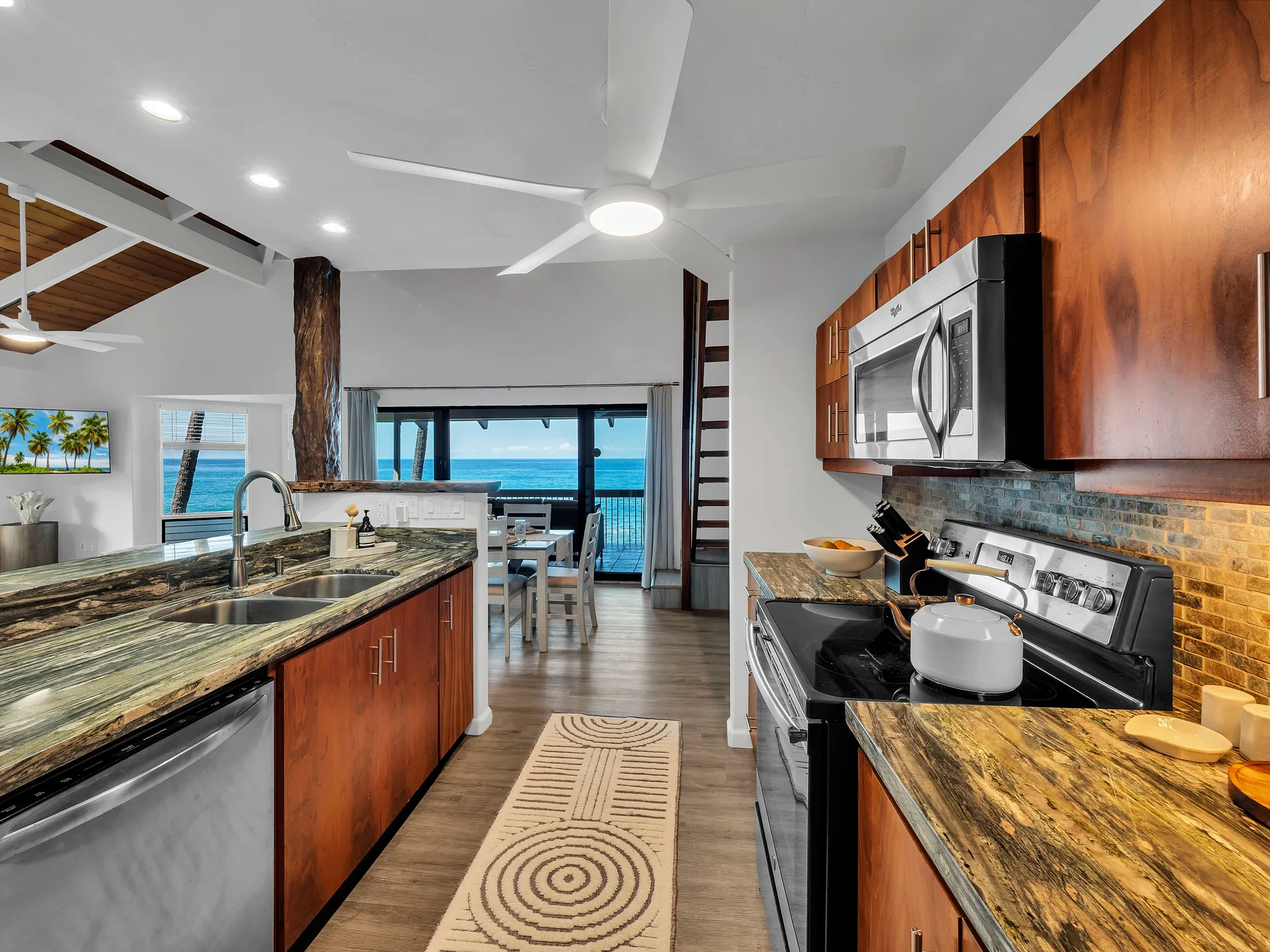 Kitchen bar with staircase and wood post detail