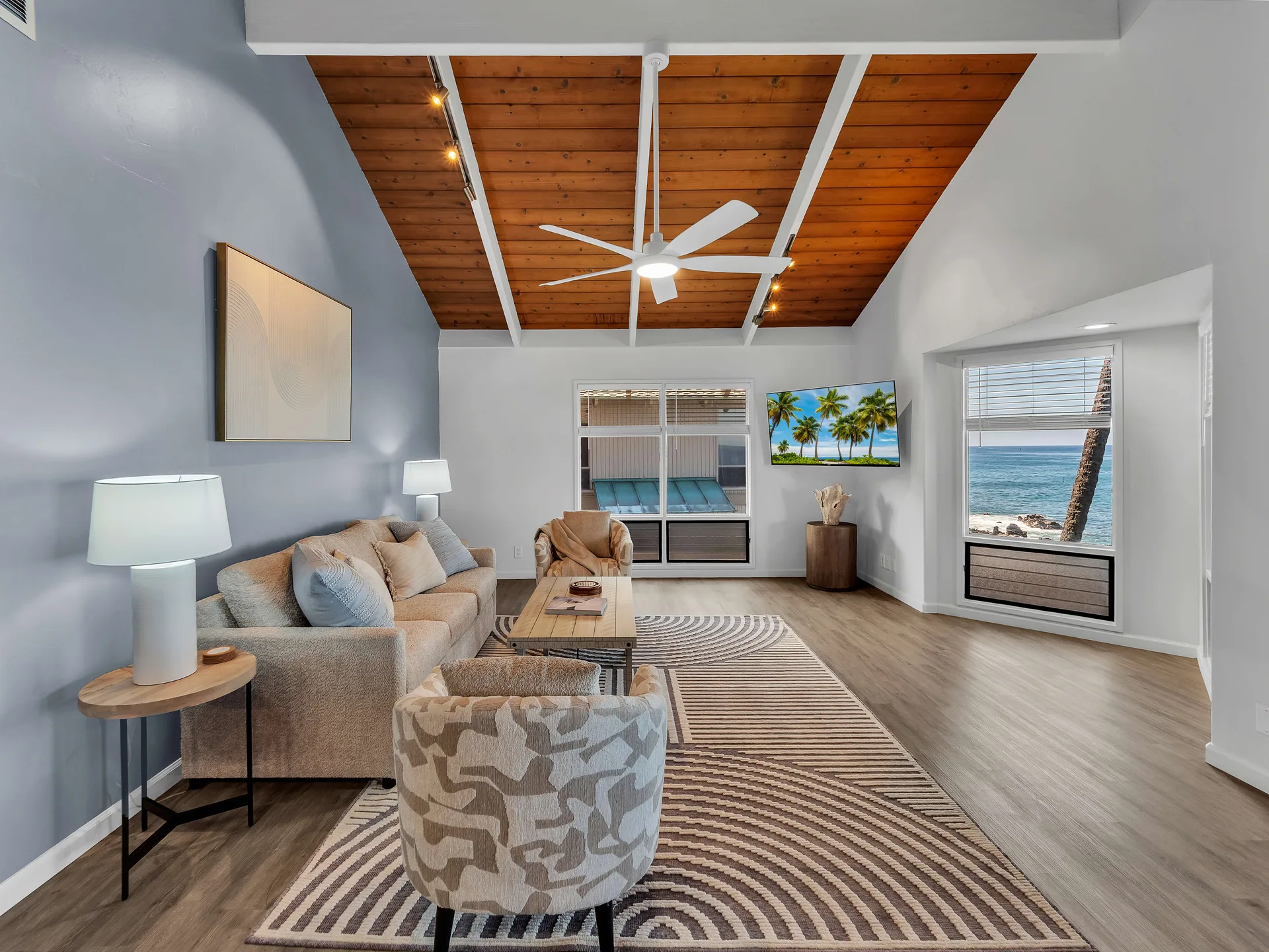 Open-concept living area with cathedral ceiling