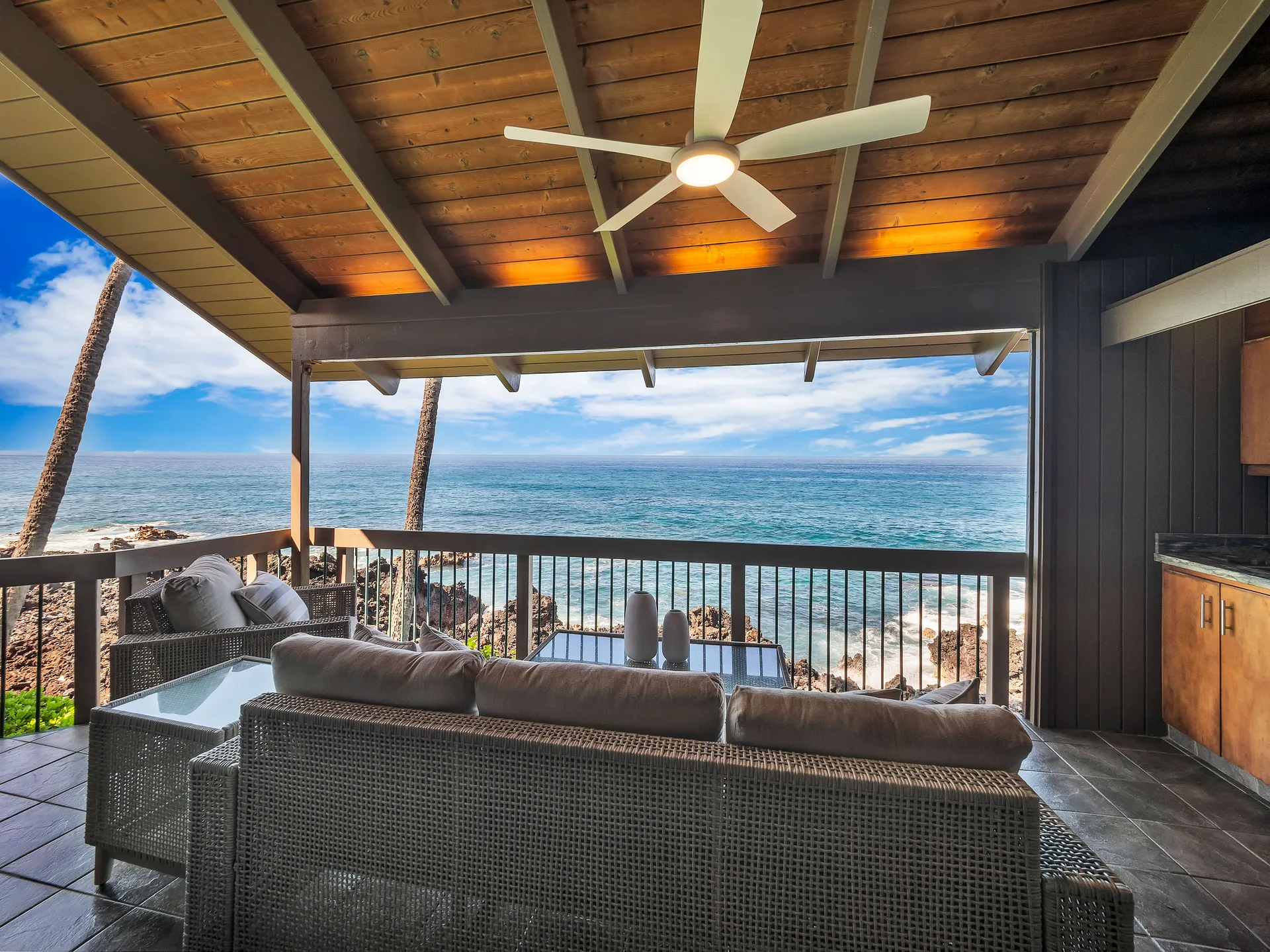 Private lanai with seating and panoramic ocean views