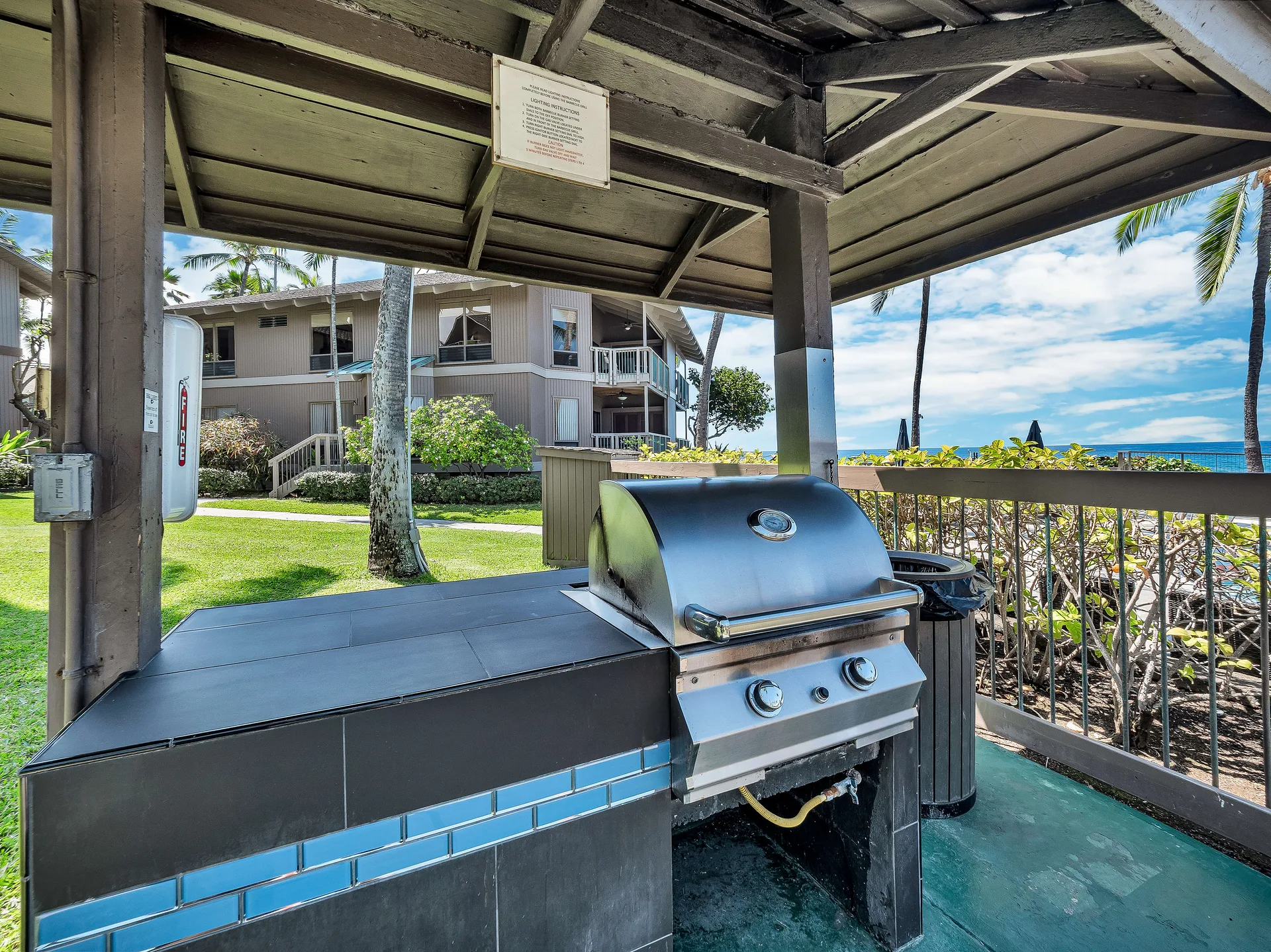 BBQ station with ocean and palm views