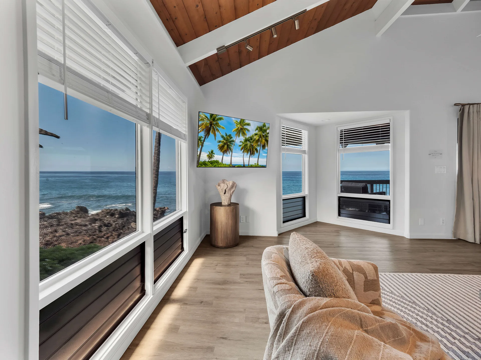 Floor-to-ceiling ocean views from the living room
